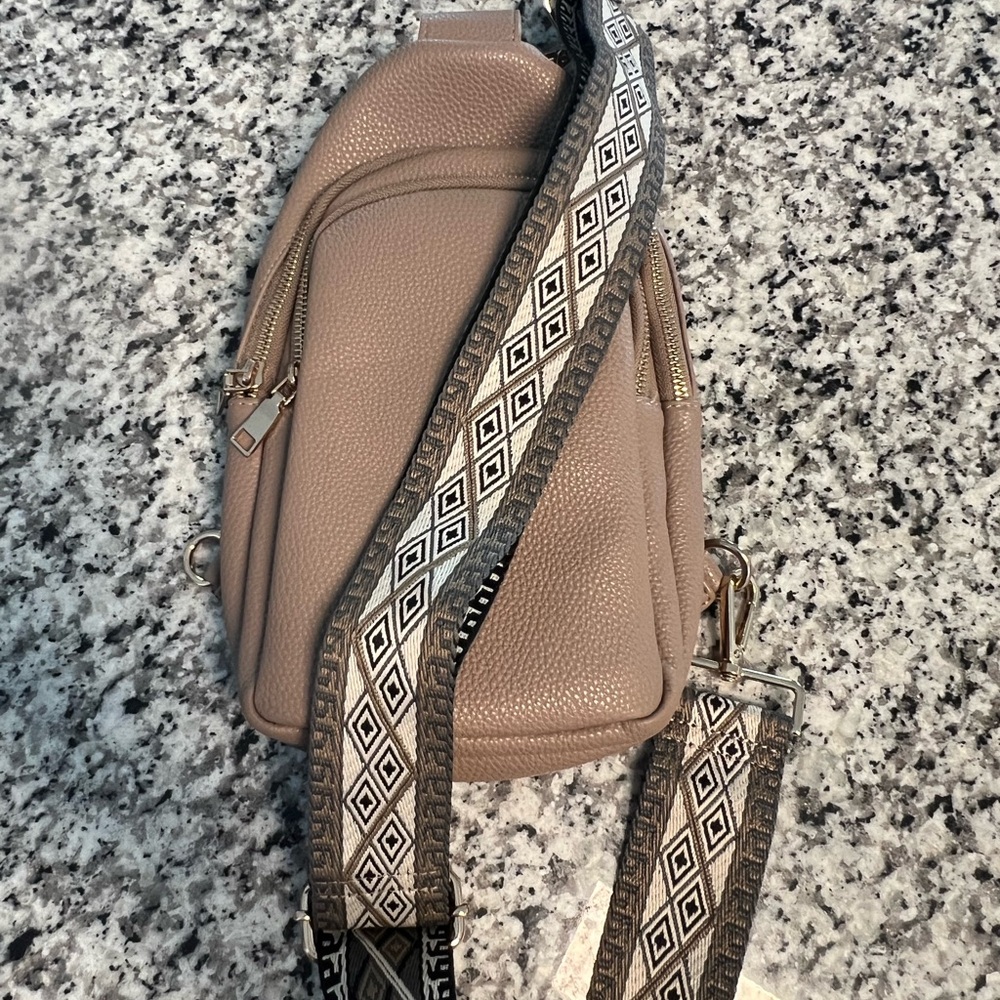 Stylish Tan Crossbody Bag with Patterned Strap